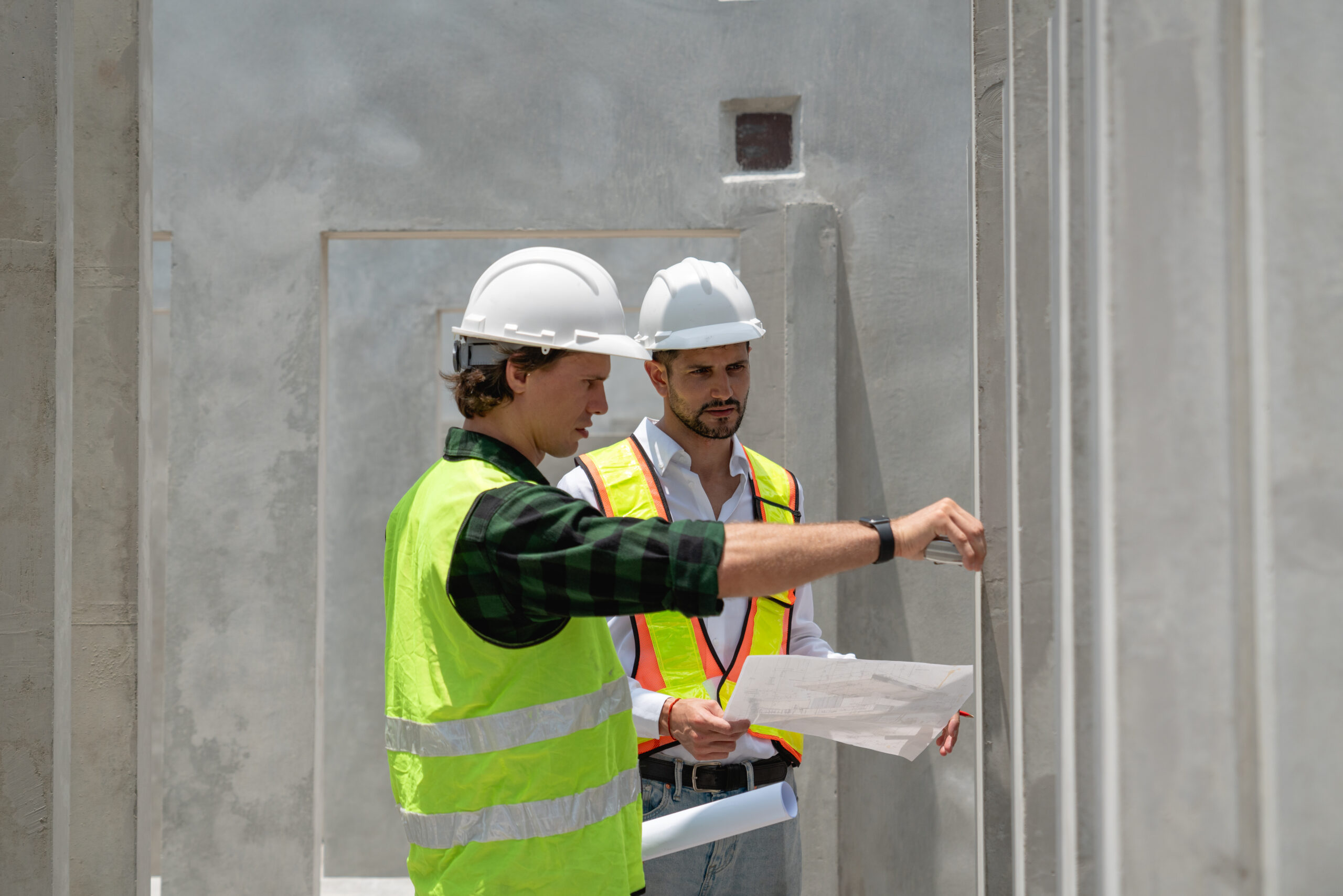 construction workers reviewing plans on a building 2026 03 24 05 26 27 utc scaled